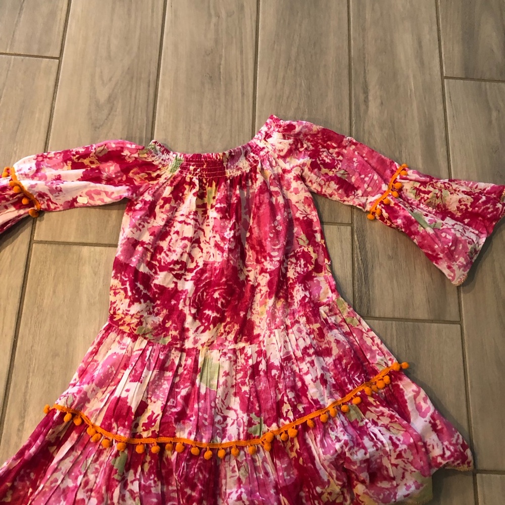 Pretty dress or coverup with bell sleeves. Can be worn off the shoulders.